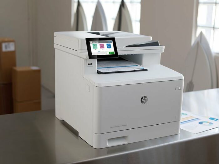 HP Colour LaserJet Enterprise MFP M480f in a workplace