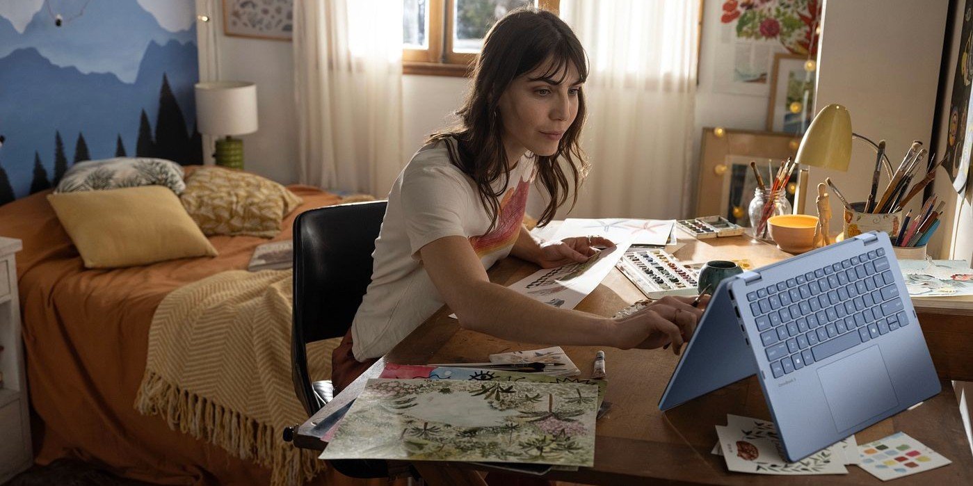 A professional woman working in her HP OmniBook X Flip 2-in-1 